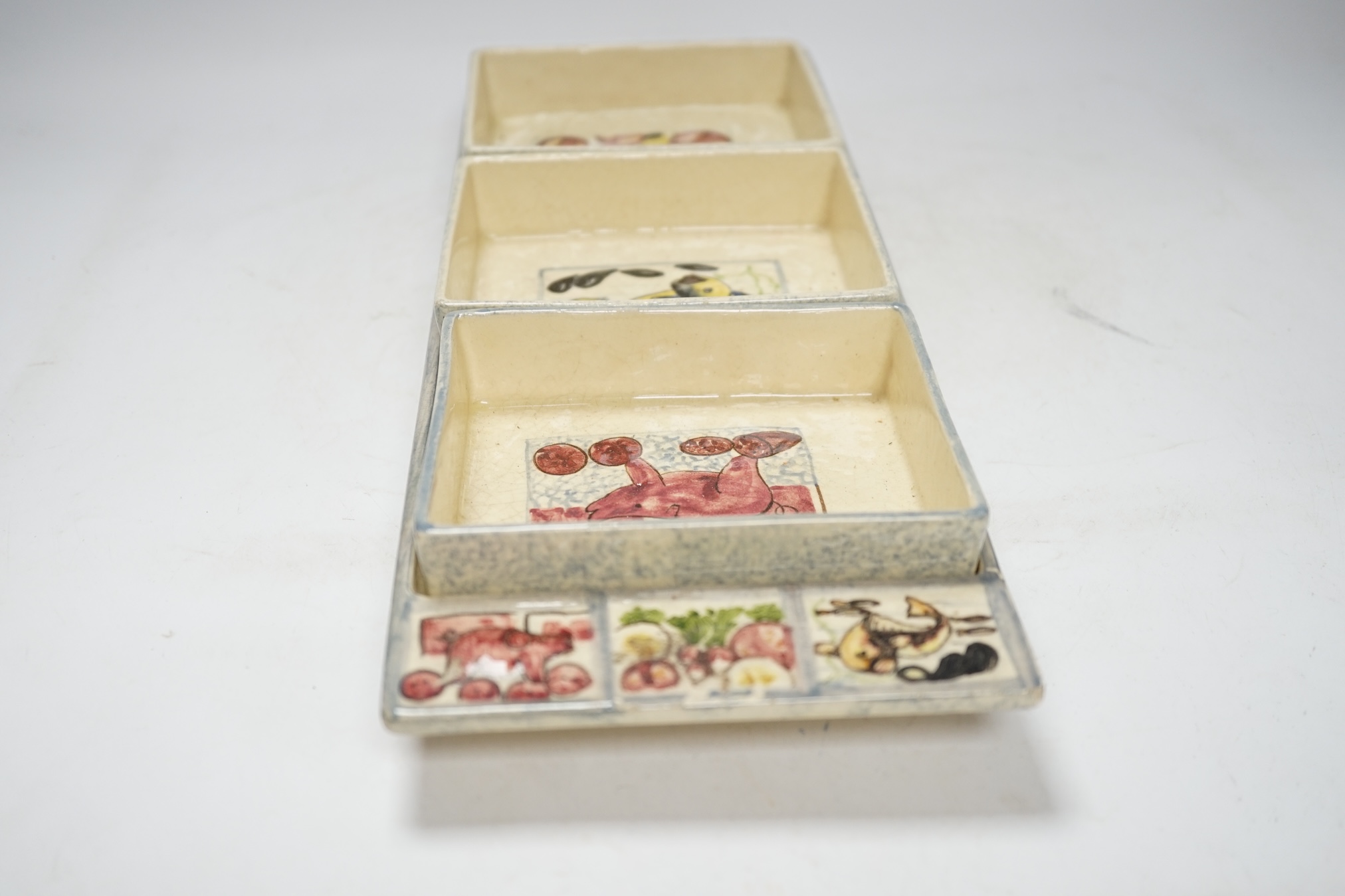 From the Studio of Fred Cuming. An Italian ceramic three section tray set, 43cm wide. Condition - fair, crazing throughout